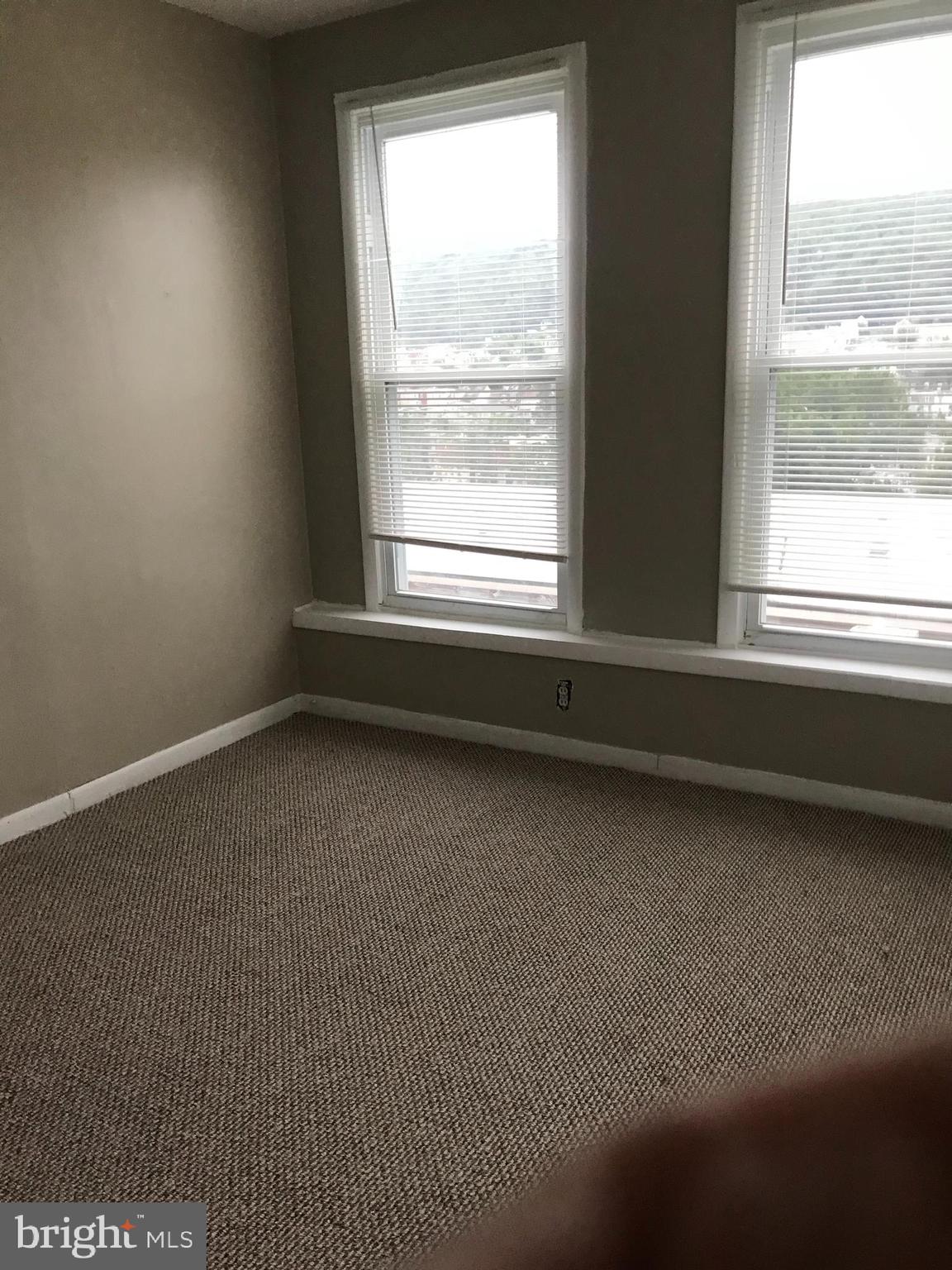 1626 Mineral Spring Road Reading, PA 19602 - Photo 9 of 20 a view of an empty room with a window
