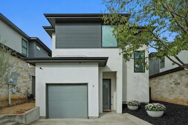 a front view of a house with patio