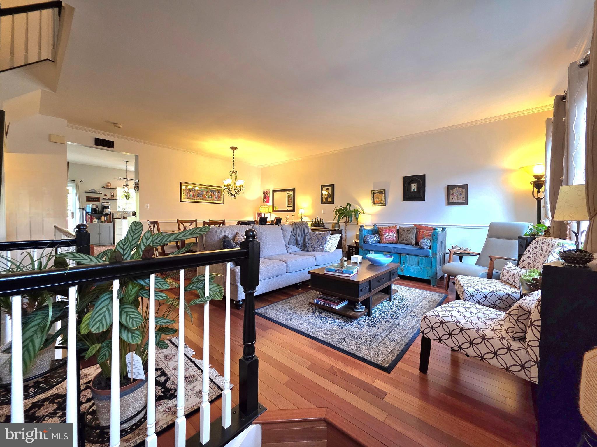 2826 Roesh Way Vienna, VA 22181 - Photo 2 of 36 a living room with furniture and a wooden floor