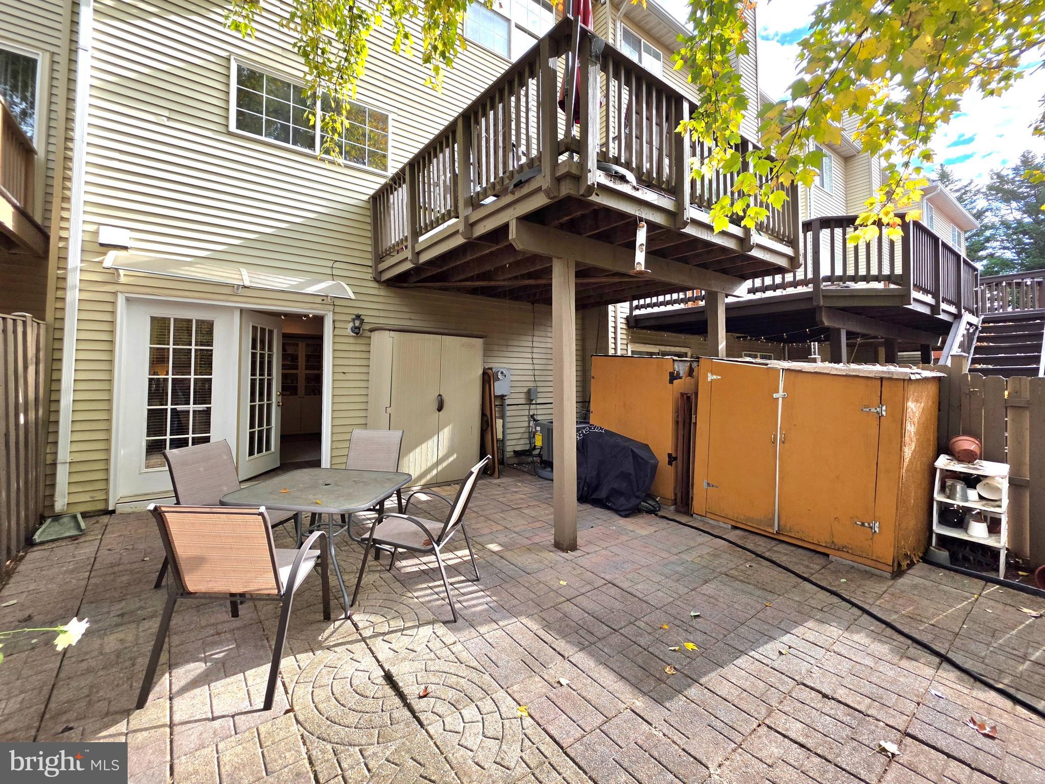 2826 Roesh Way Vienna, VA 22181 - Photo 32 of 36 a view of a chair and table on the house