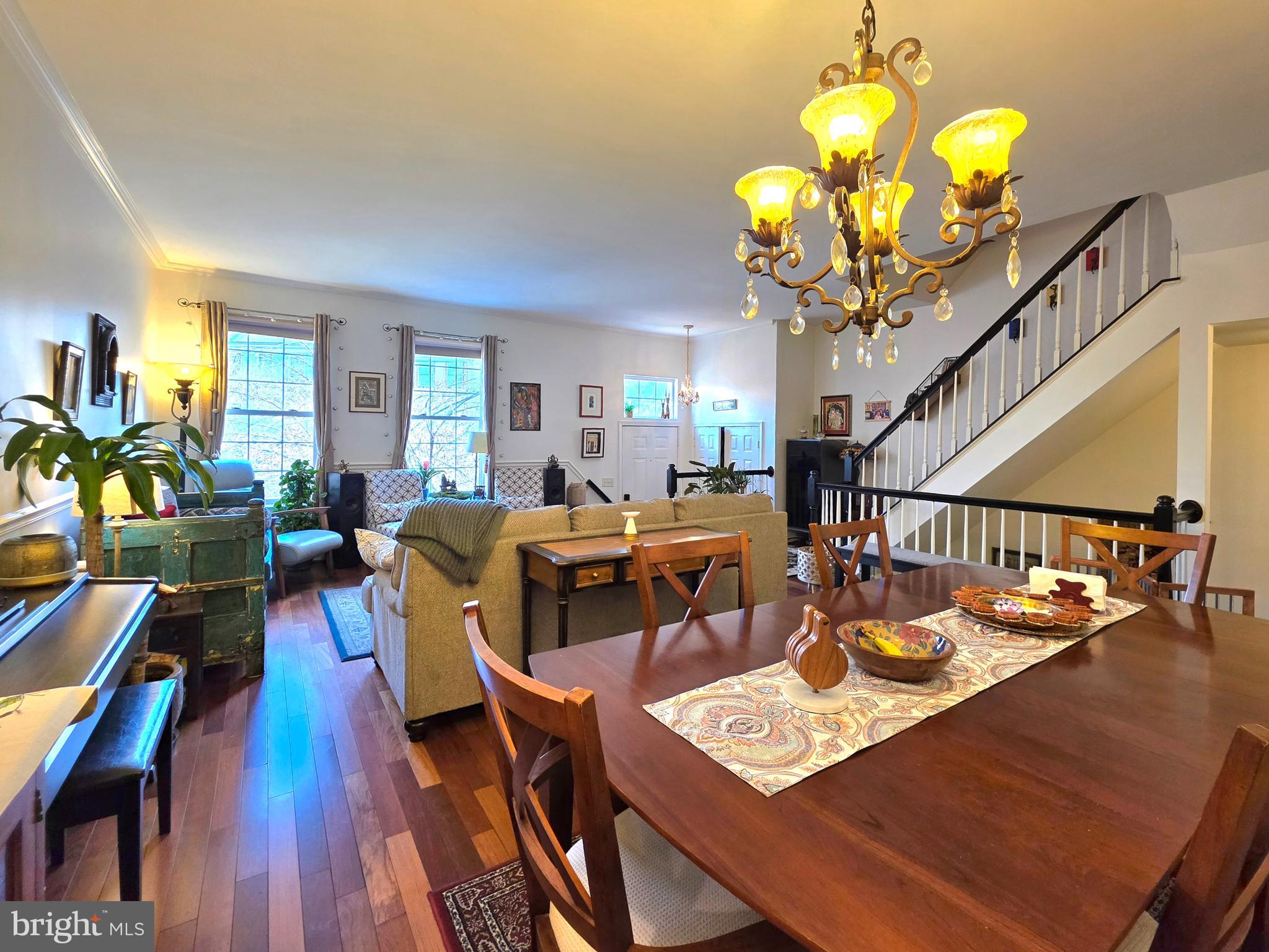 2826 Roesh Way Vienna, VA 22181 - Photo 5 of 36 a view of a dining room with furniture and a chandelier