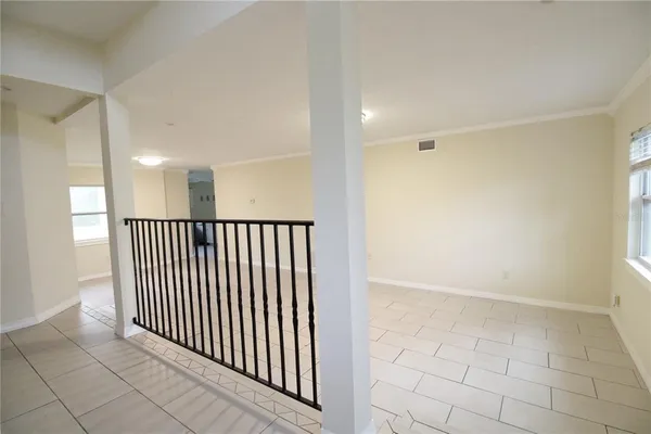 a view of an empty room and window