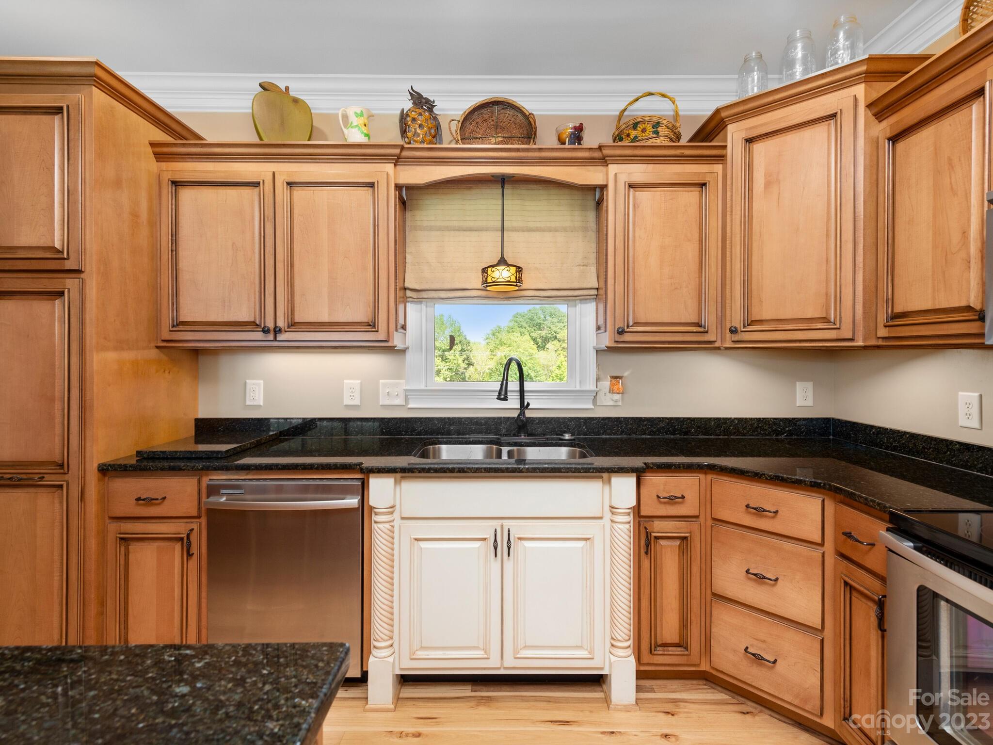 95 Fagan Road Columbus, NC 28722 - Photo 20 of 43 a kitchen with stainless steel appliances granite countertop a stove a sink and a microwave