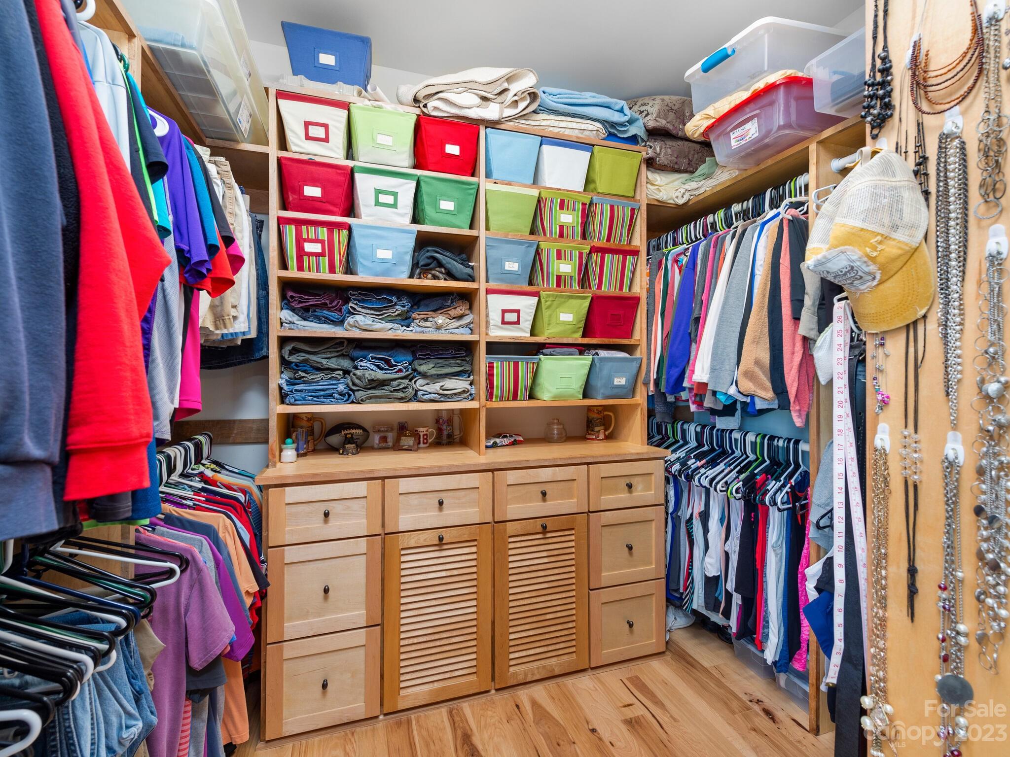 95 Fagan Road Columbus, NC 28722 - Photo 30 of 43 a view of walk in closet with clothes and shoes