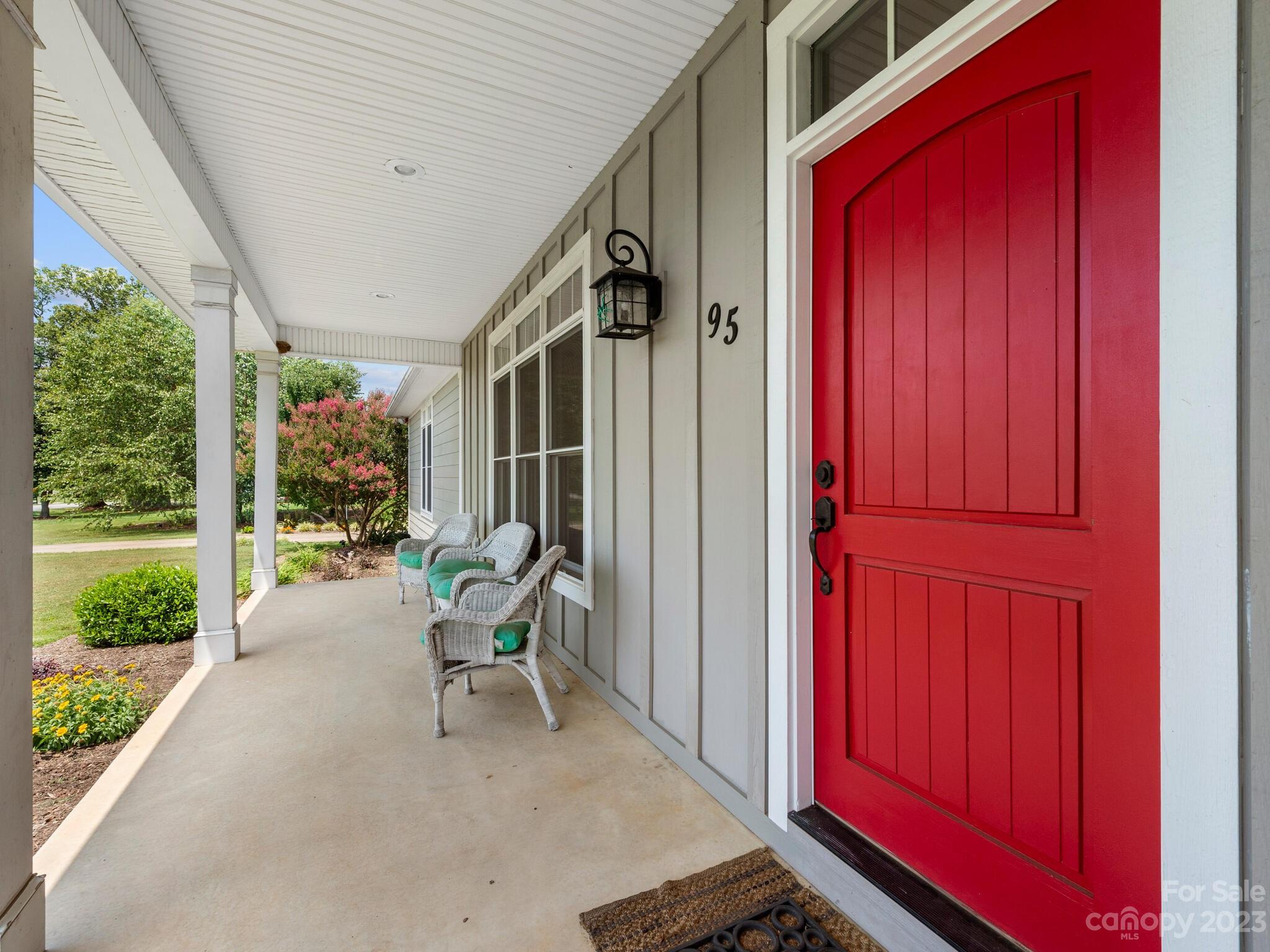 95 Fagan Road Columbus, NC 28722 - Photo 5 of 43 a view of a porch with chairs and backyard