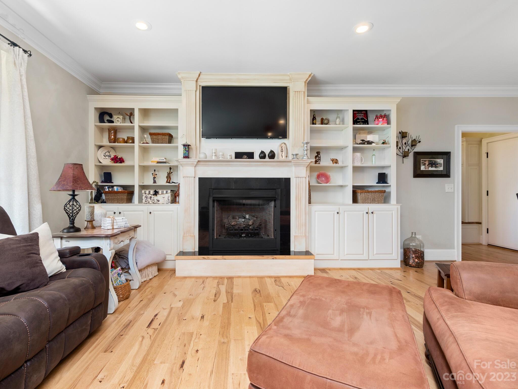 95 Fagan Road Columbus, NC 28722 - Photo 9 of 43 a living room with fireplace furniture and a flat screen tv