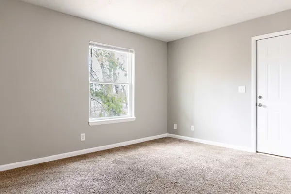 an empty room with a window