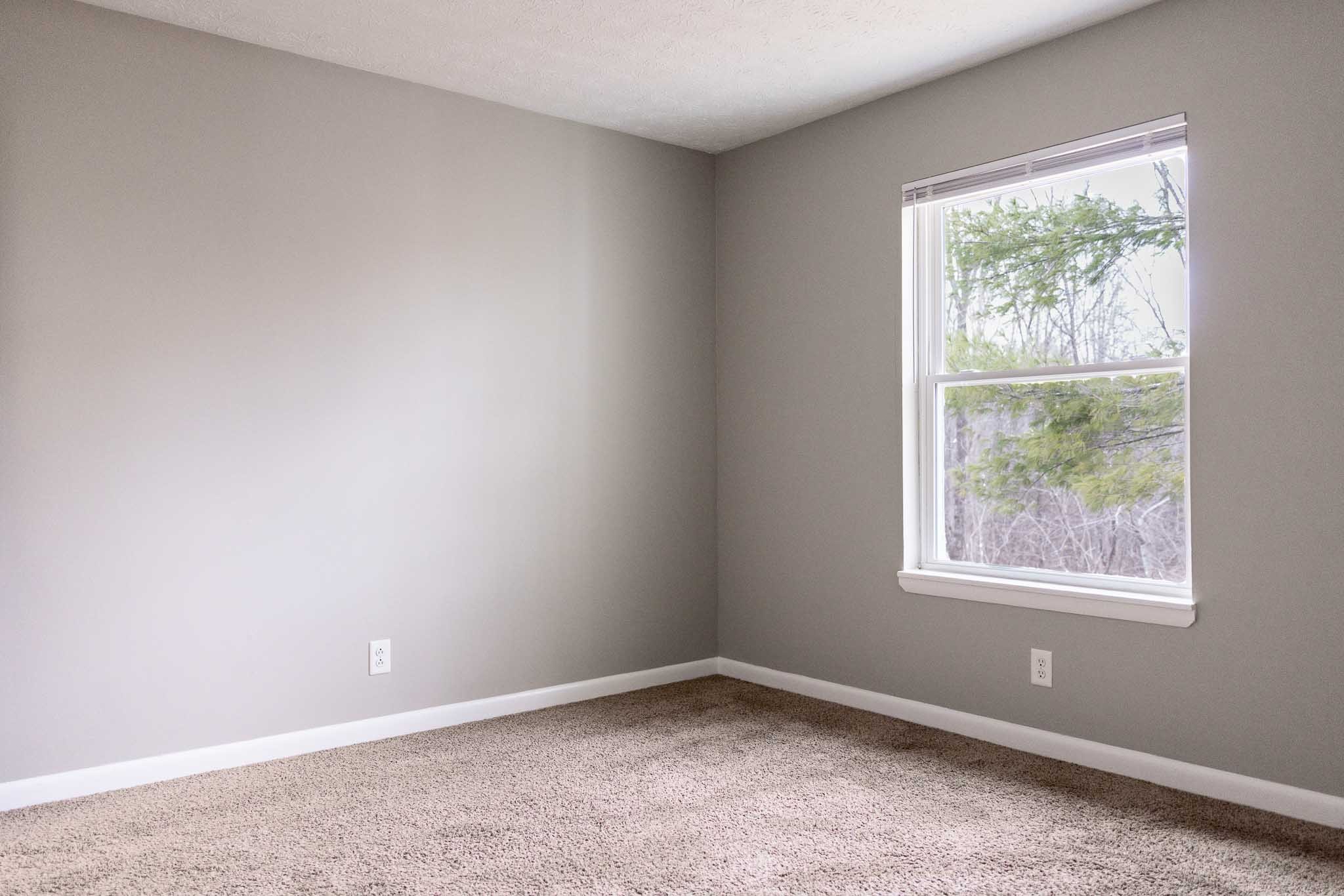 100 Valley View Drive, Unit E49 Dickson, TN 37055 - Photo 7 of 11 an empty room with a window