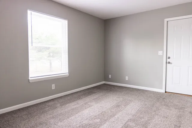 an empty room with a window