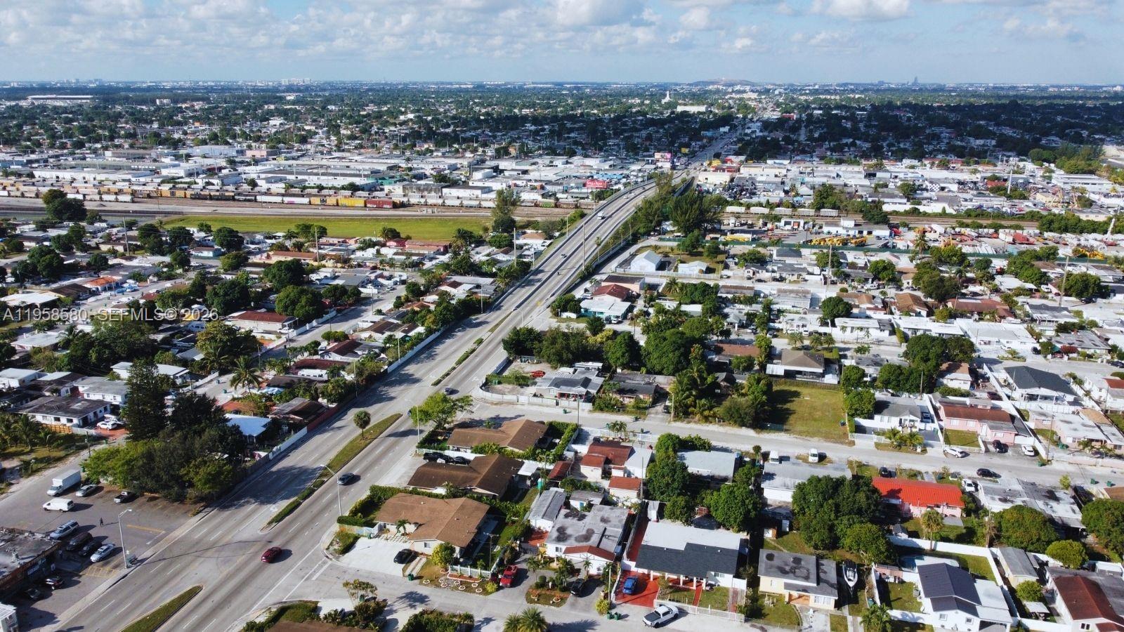 3575 Northwest 103rd Street Miami, FL 33147 - Photo 13 of 13 an aerial view of a city