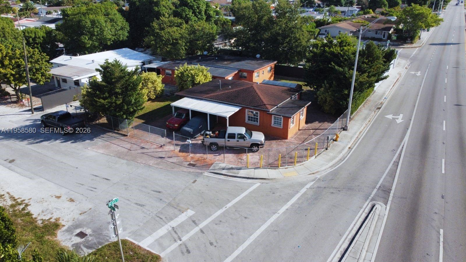 3575 Northwest 103rd Street Miami, FL 33147 - Photo 5 of 13 an outdoor space with patio