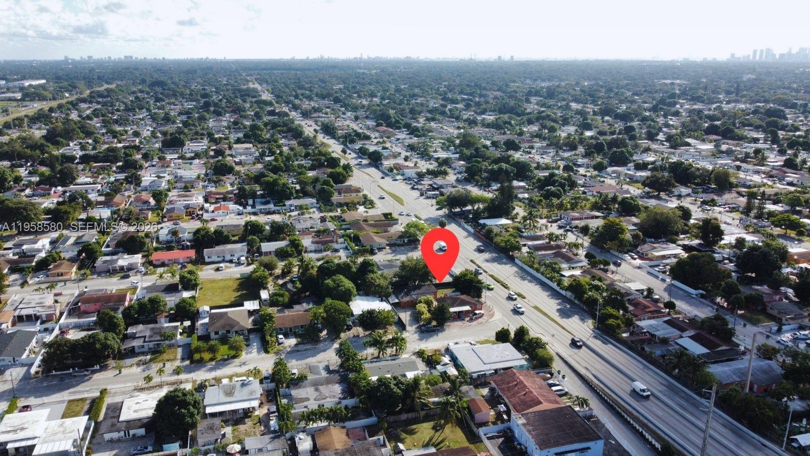 3575 Northwest 103rd Street Miami, FL 33147 - Photo 9 of 13 an aerial view of city