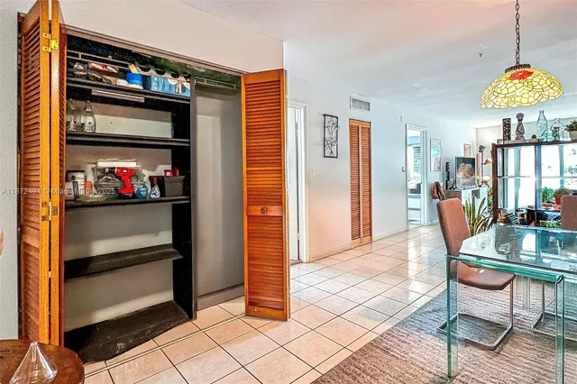 a view of a livingroom with furniture and window