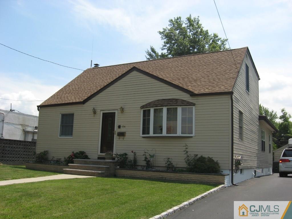 194 Midfield Road Colonia, NJ 07067 - Photo 1 of 25 a aerial view of a house with a yard