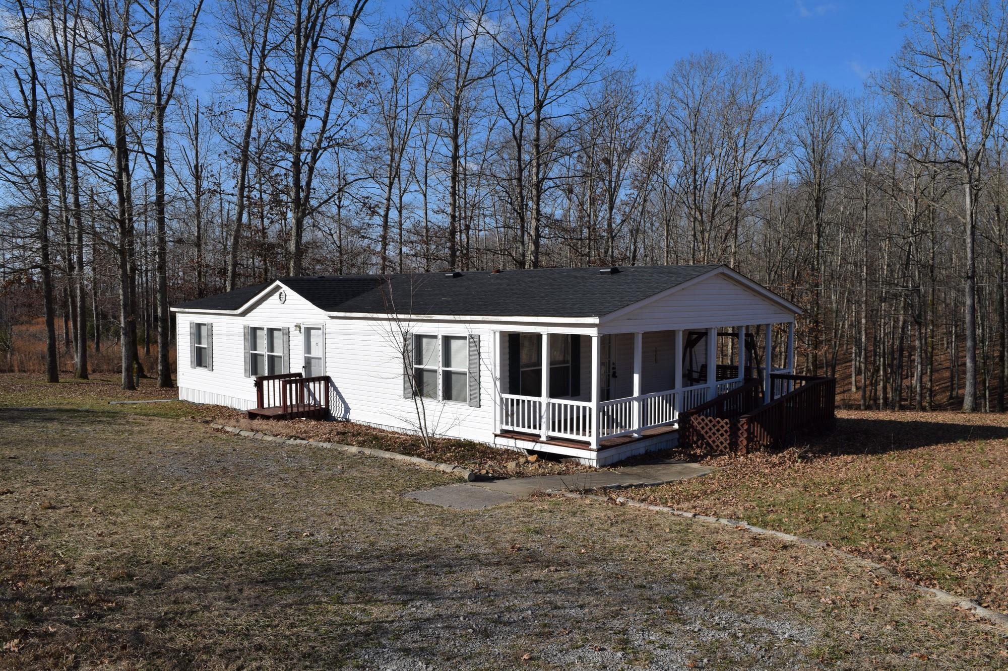 1050 Half Pone Road Erin, TN 37061 - Photo 2 of 13 Side view-notice ramp that is accessible for the screened in porch
