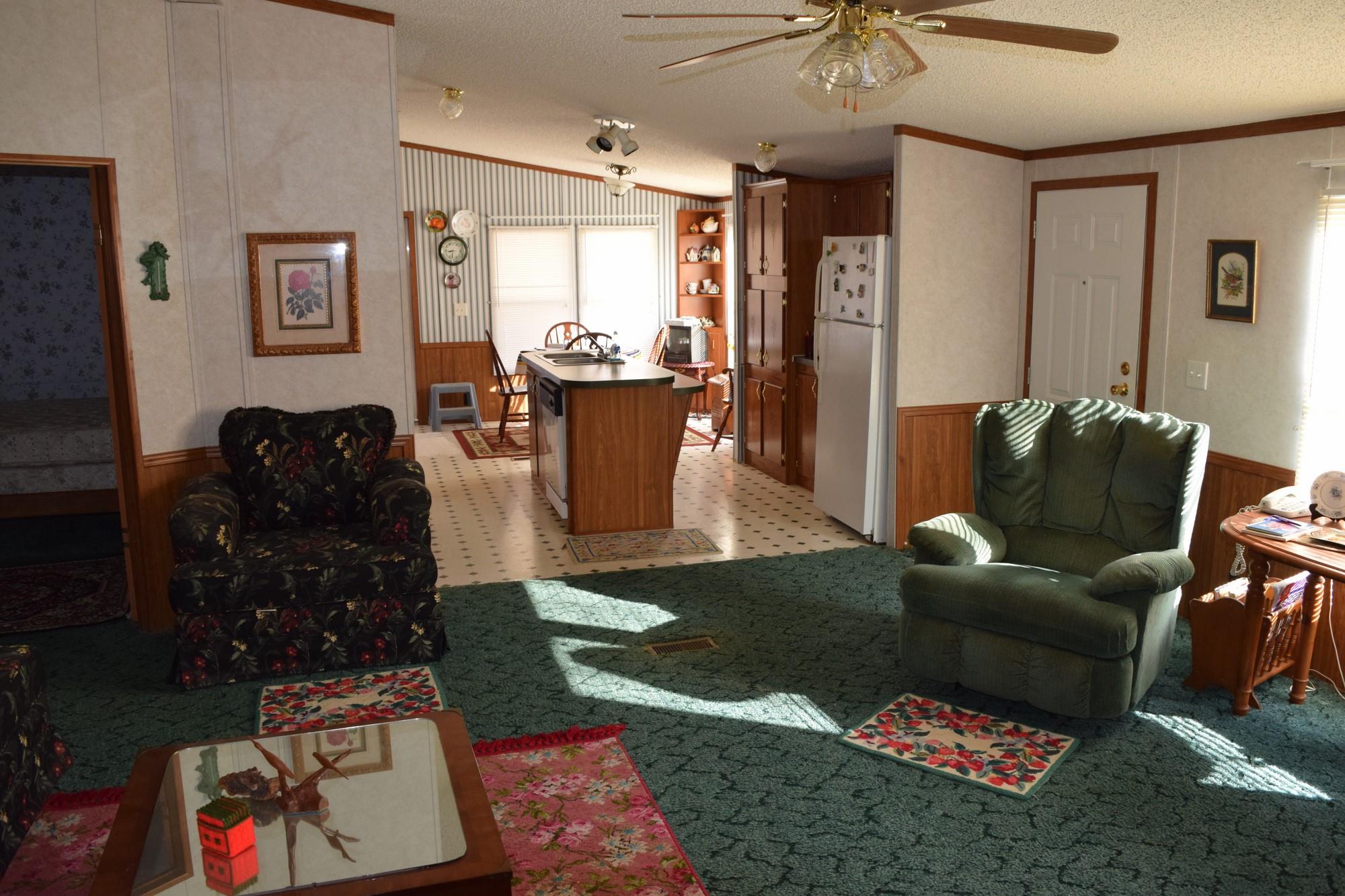 1050 Half Pone Road Erin, TN 37061 - Photo 8 of 13 living room view into kitchen