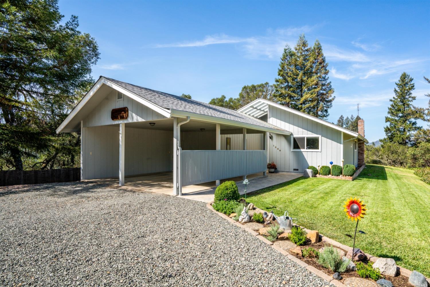 1280 Rd B Redwood Valley, CA 95470 - Photo 1 of 1 a front view of house with yard and trees around