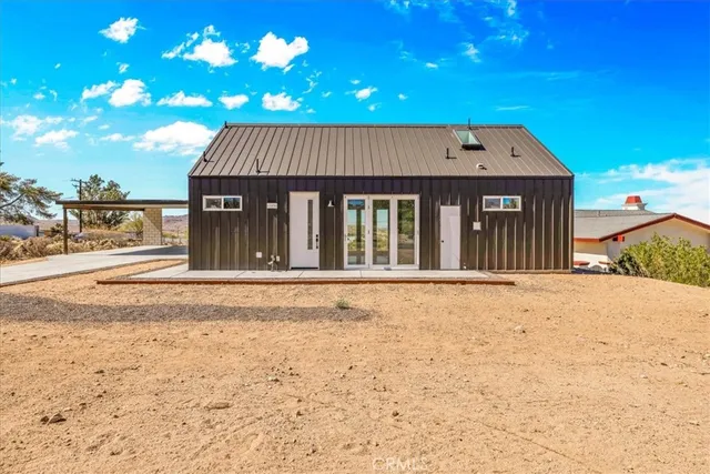 a view of an house with backyard space