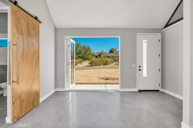 a view of a room with a window