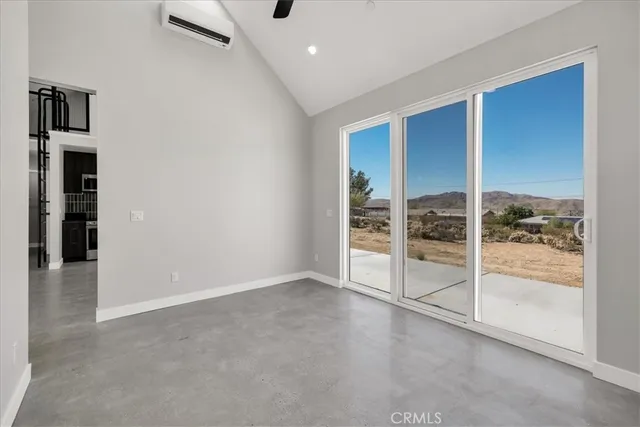 a bathroom with a granite countertop double vanity sink and mirror