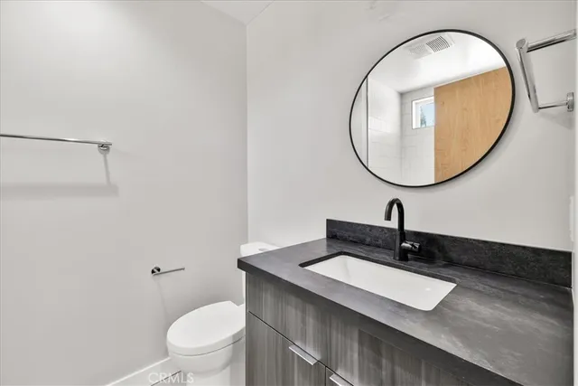 a view of a hallway with washer and dryer