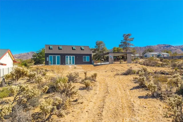 a view of a large body of water with a mountain