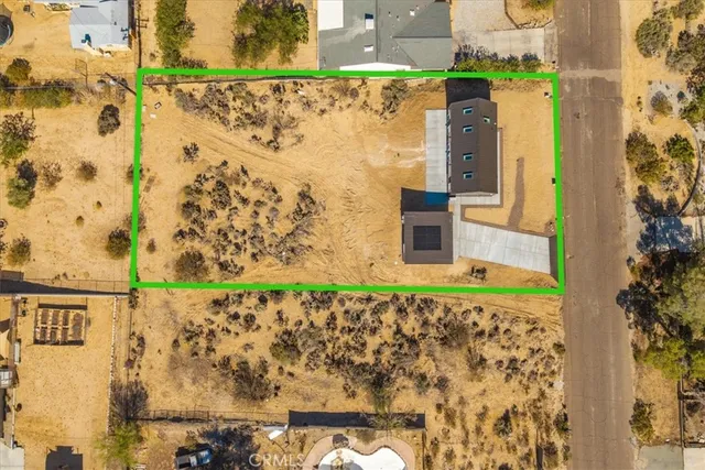 an aerial view of residential house and ocean