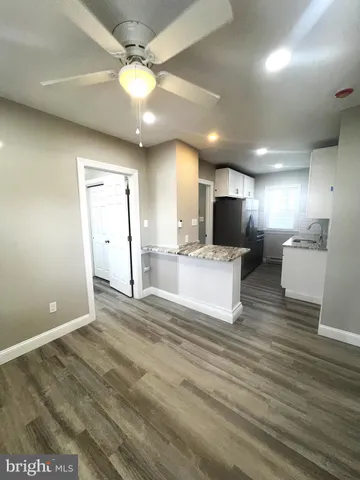a view of a livingroom with a flat screen tv