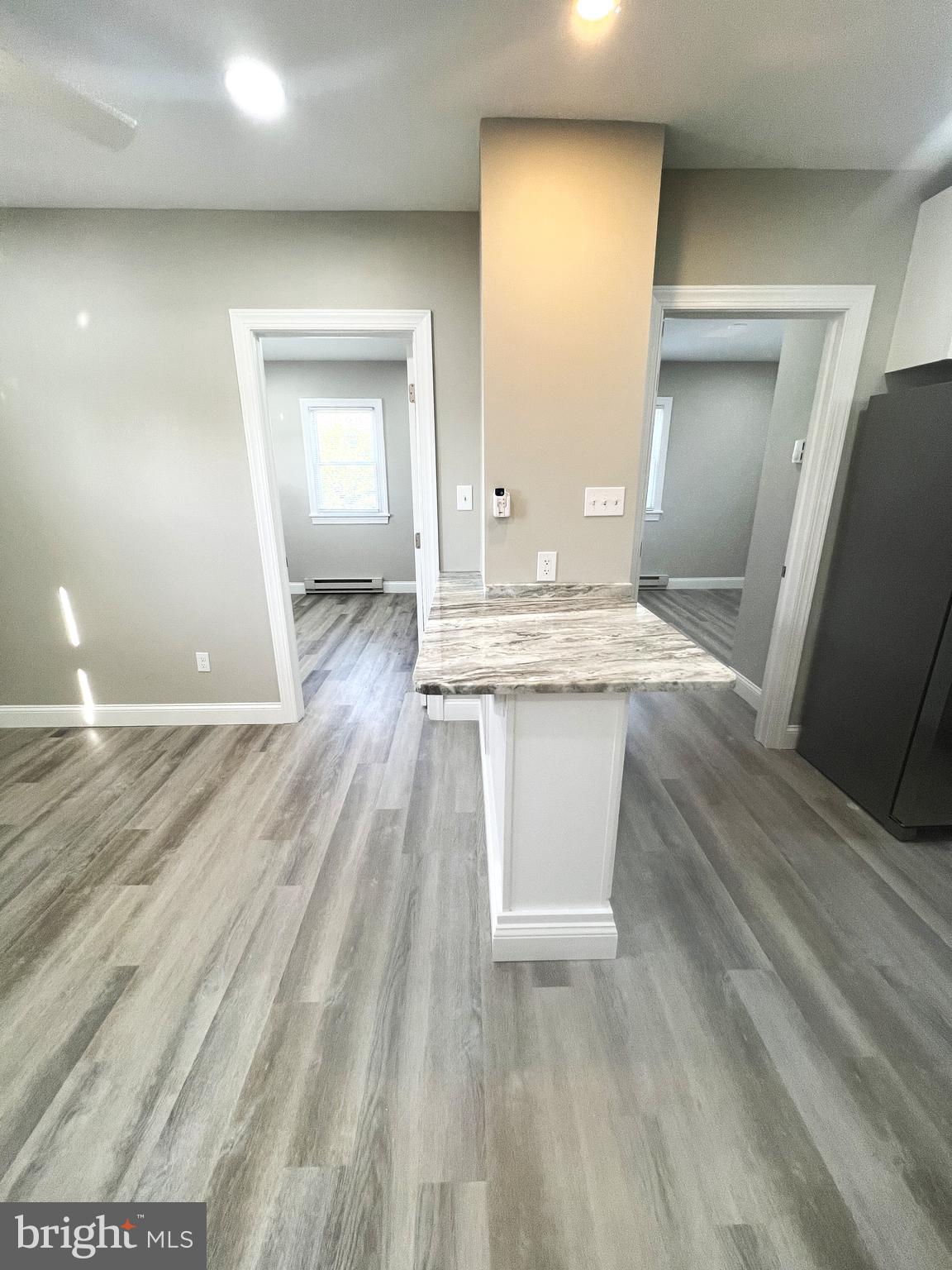 30 Spruce Avenue, Unit B Maple Shade, NJ 08052 - Photo 9 of 23 a room view with wooden floor and bathroom view