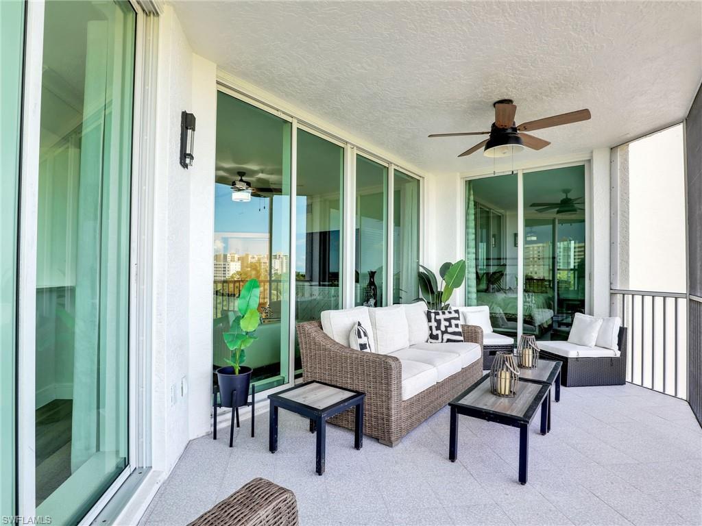 325 Dunes Boulevard, Unit 403 Naples, FL 34110 - Photo 21 of 49 a living room with furniture and a window