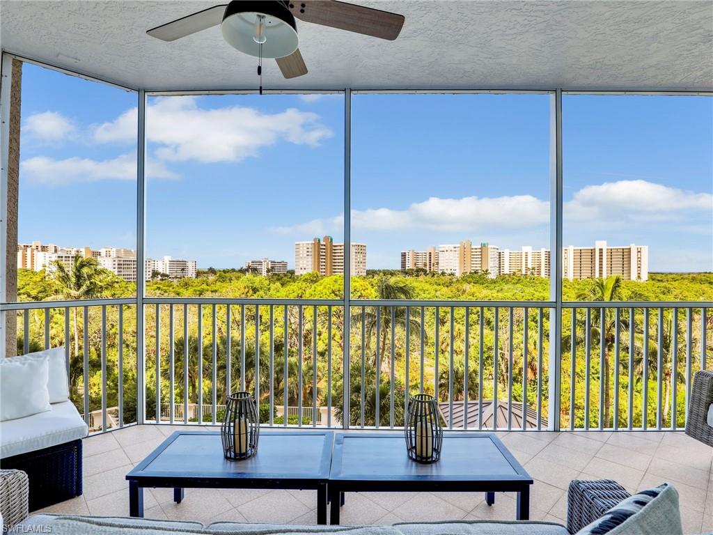 325 Dunes Boulevard, Unit 403 Naples, FL 34110 - Photo 22 of 49 a view of swimming pool from a balcony