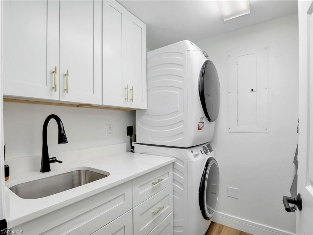 325 Dunes Boulevard, Unit 403 Naples, FL 34110 - Photo 34 of 49 a close view of sink and tap