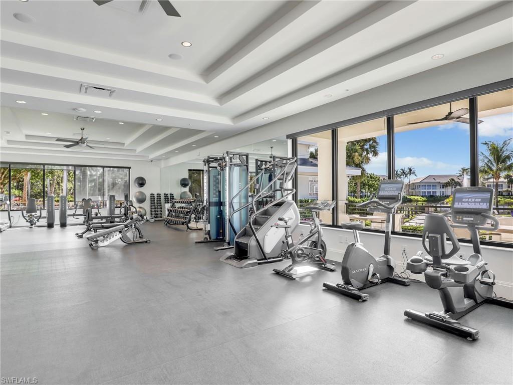 325 Dunes Boulevard, Unit 403 Naples, FL 34110 - Photo 36 of 49 a view of a room with gym equipment