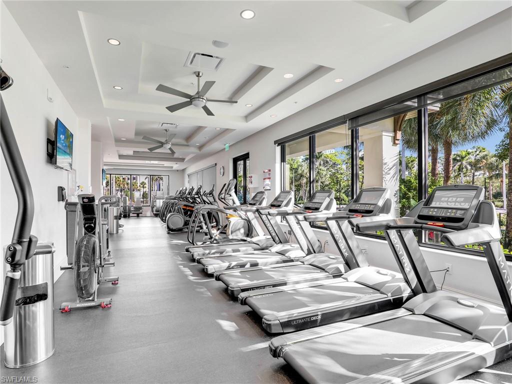 325 Dunes Boulevard, Unit 403 Naples, FL 34110 - Photo 37 of 49 a view of a room with gym equipment