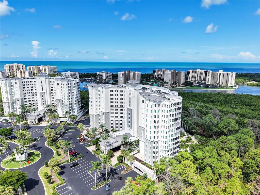 325 Dunes Boulevard, Unit 403 Naples, FL 34110 - Photo 44 of 49 a view of a balcony with chairs