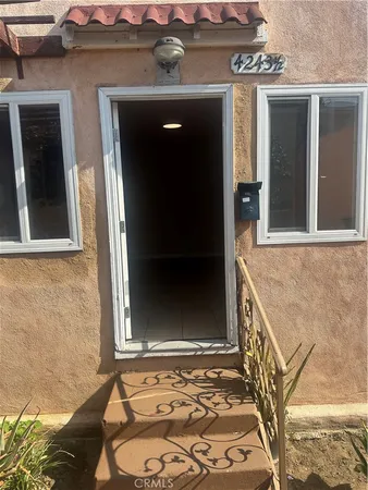 front view of a house with a shower