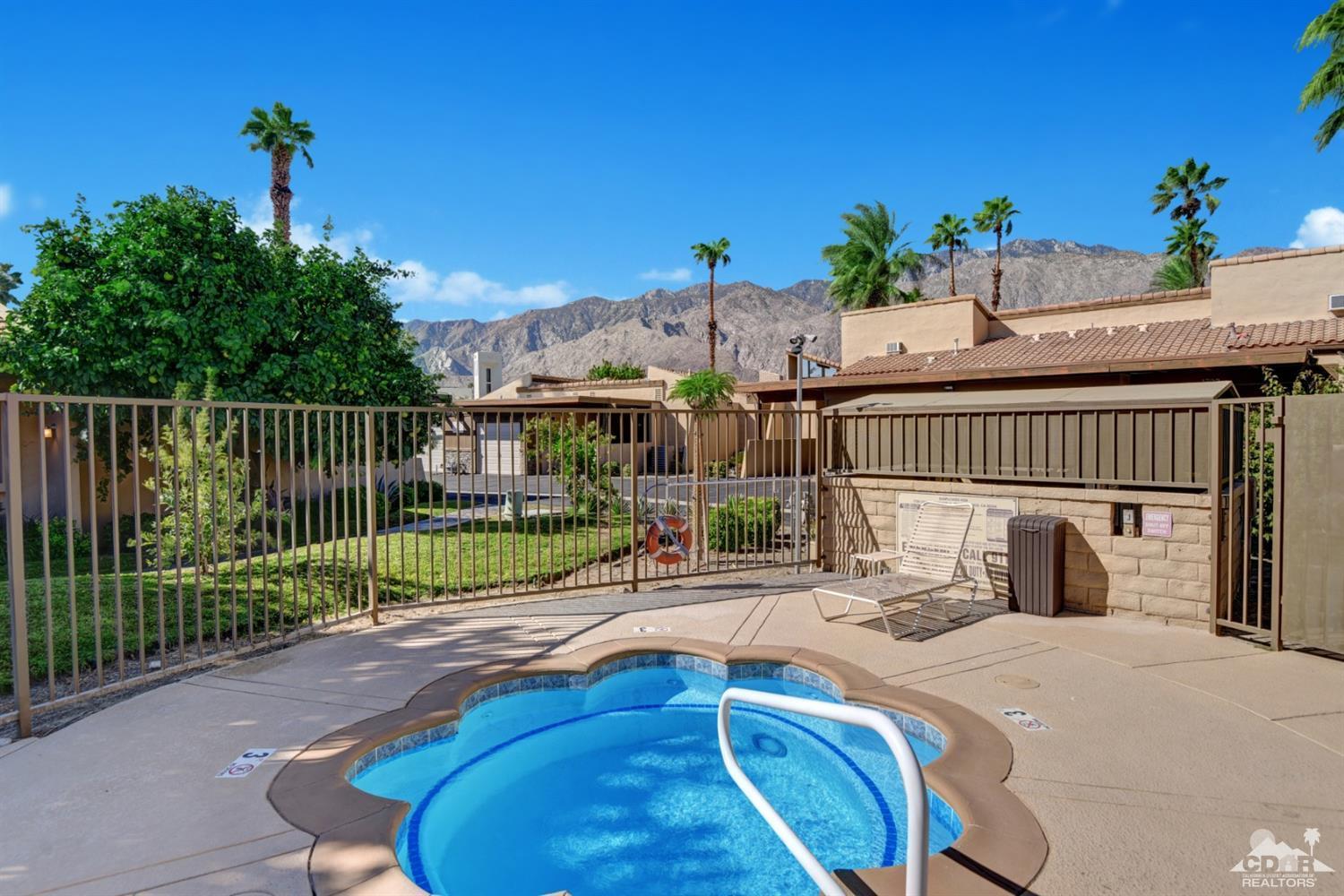 1723 Ramon Road, Unit 37 Palm Springs, CA 92264 - Photo 8 of 10 a view of a swimming pool with a patio