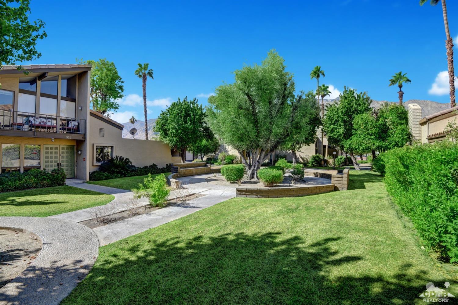 1723 Ramon Road, Unit 37 Palm Springs, CA 92264 - Photo 9 of 10 a view of a fountain in front of house
