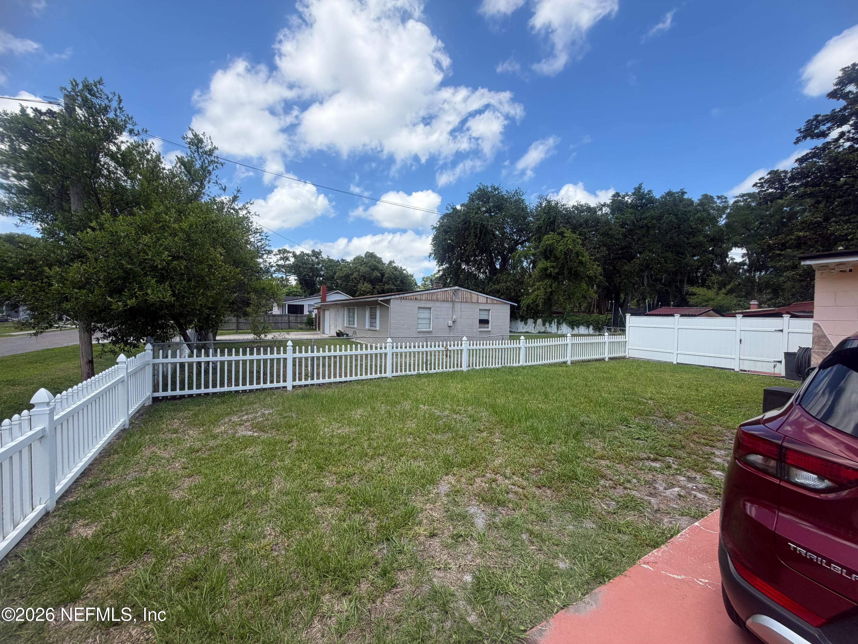 4127 Springwood Road Jacksonville, FL 32207 - Photo 3 of 63 a view of a park with swings and slides