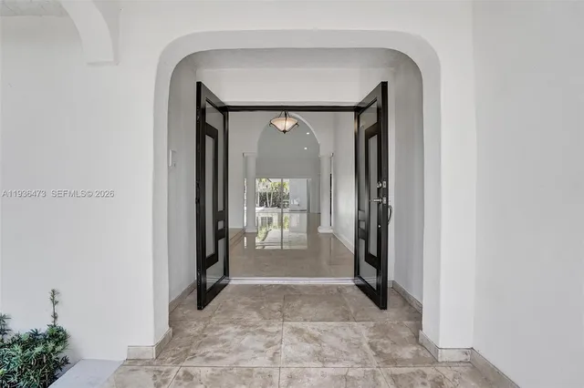 a view of a livingroom with furniture window and outside view