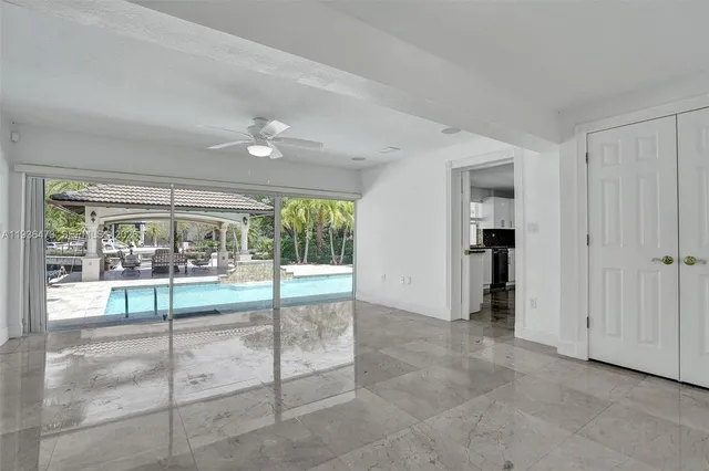 a bathroom with a bathtub and shower