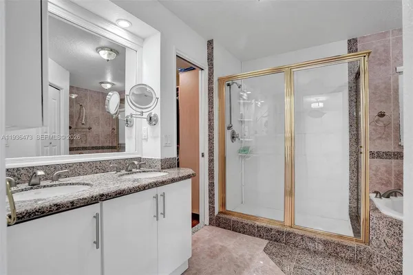 a view of an empty room with a fireplace