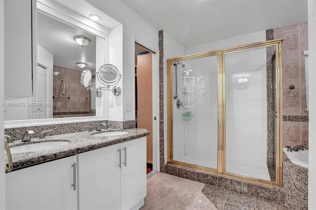 a view of an empty room with a fireplace