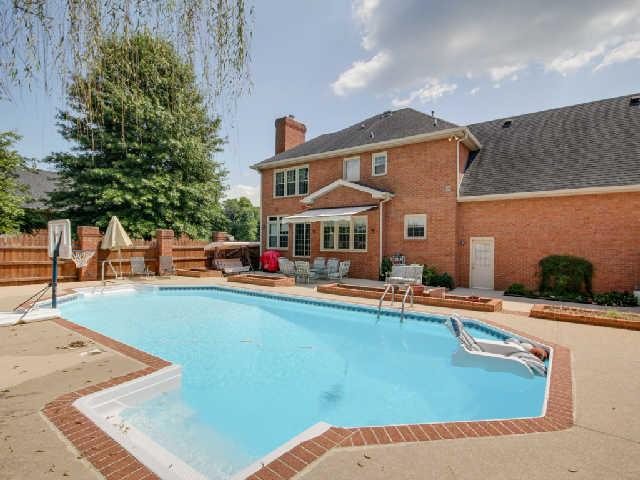 1736 Stop 30 Road Hendersonville, TN 37075 - Photo 20 of 20 Heated Inground pool (32x16). Saltwater system for low maintenance and personal comfort. Surround Sound connected to indoor sound system. Retractable awning, brick planters and water garden. Access to half bath. Covered wet bar area behind pool.