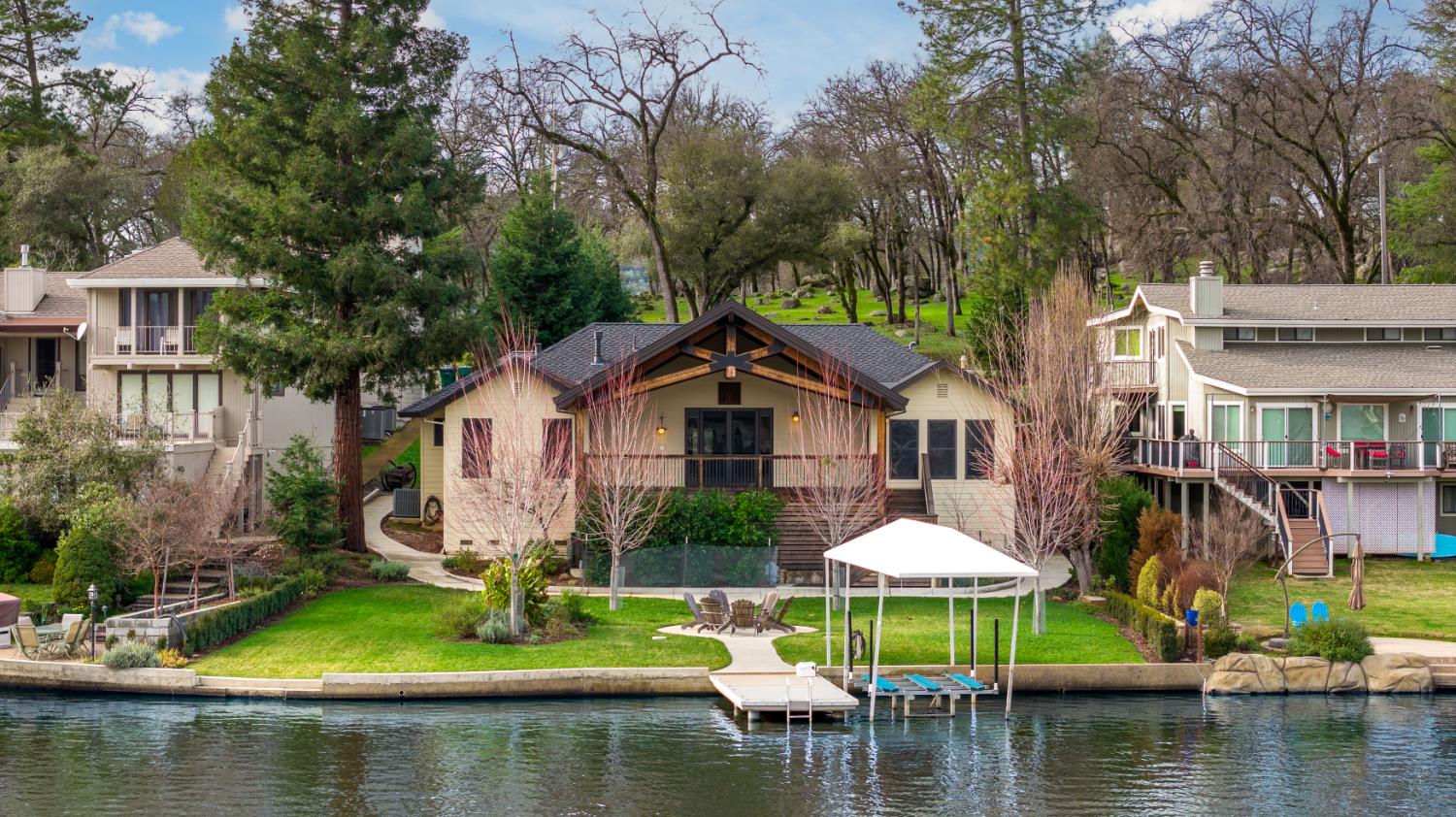 13859 Ginger Loop Penn Valley, CA 95946 - Photo 1 of 50 a front view of a house with a yard and swimming pool