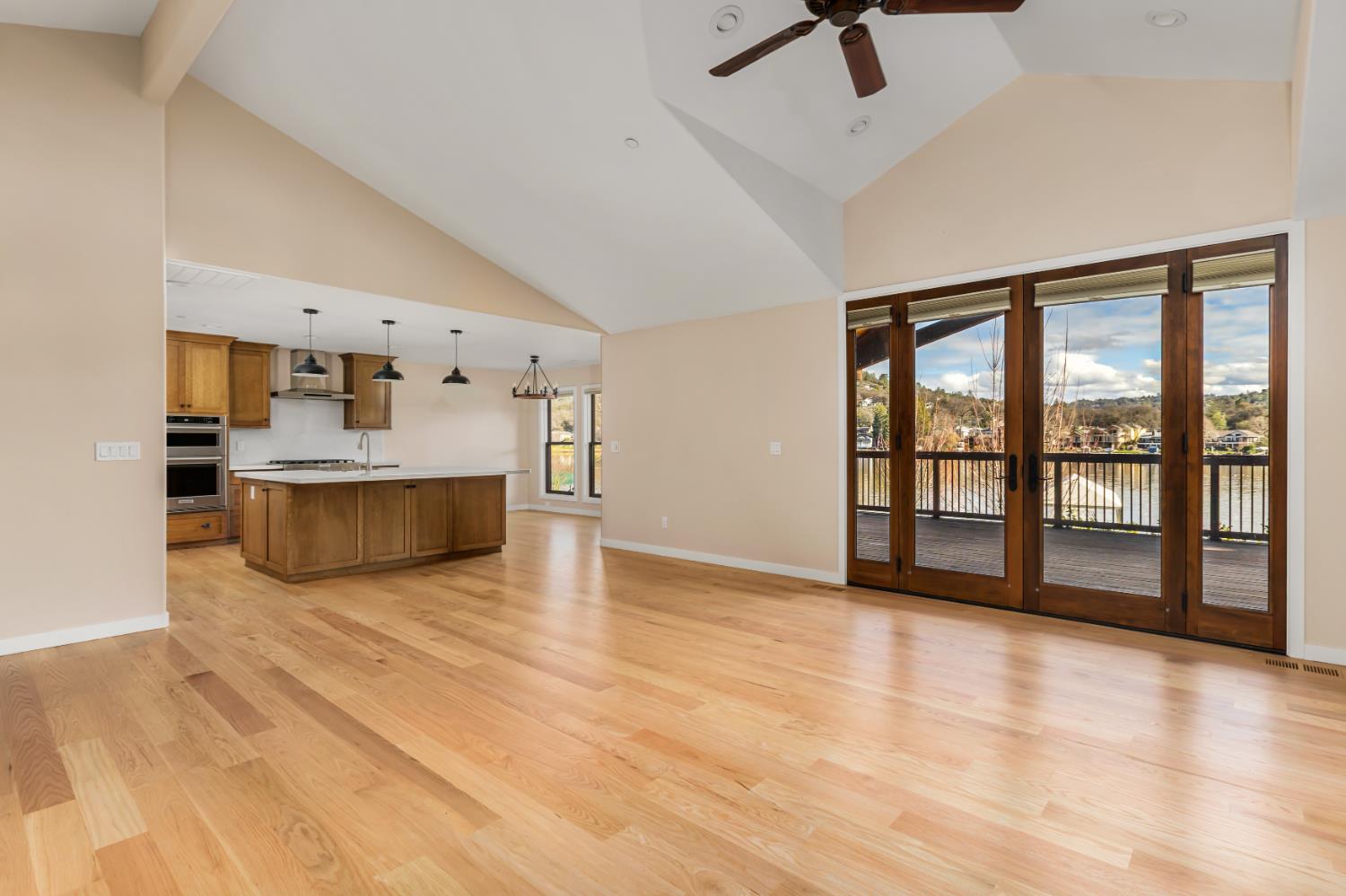 13859 Ginger Loop Penn Valley, CA 95946 - Photo 11 of 50 a view of an empty room with a window and kitchen view