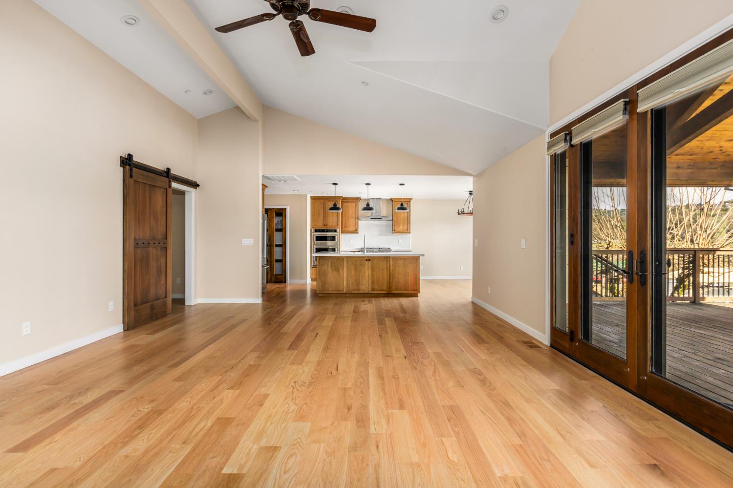 13859 Ginger Loop Penn Valley, CA 95946 - Photo 13 of 50 a view of a living room hardwood floor and an empty room