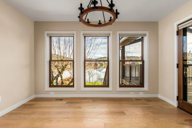 a kitchen with stainless steel appliances granite countertop a stove and a refrigerator