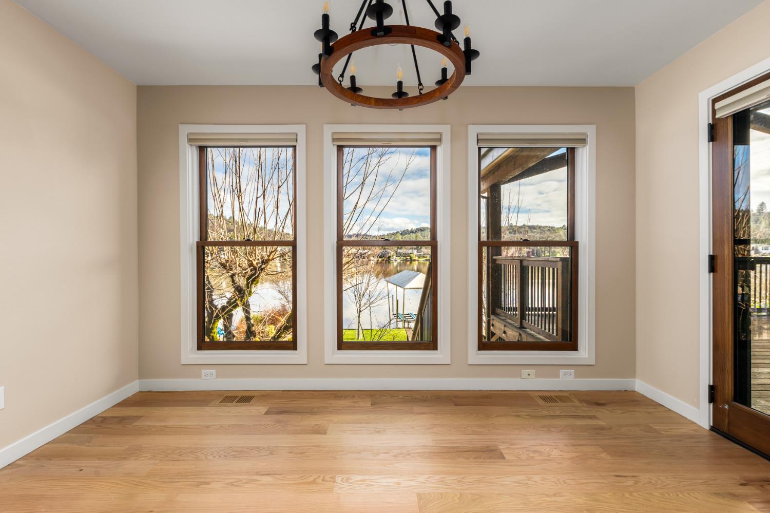 13859 Ginger Loop Penn Valley, CA 95946 - Photo 20 of 50 a view of an empty room with window and wooden floor