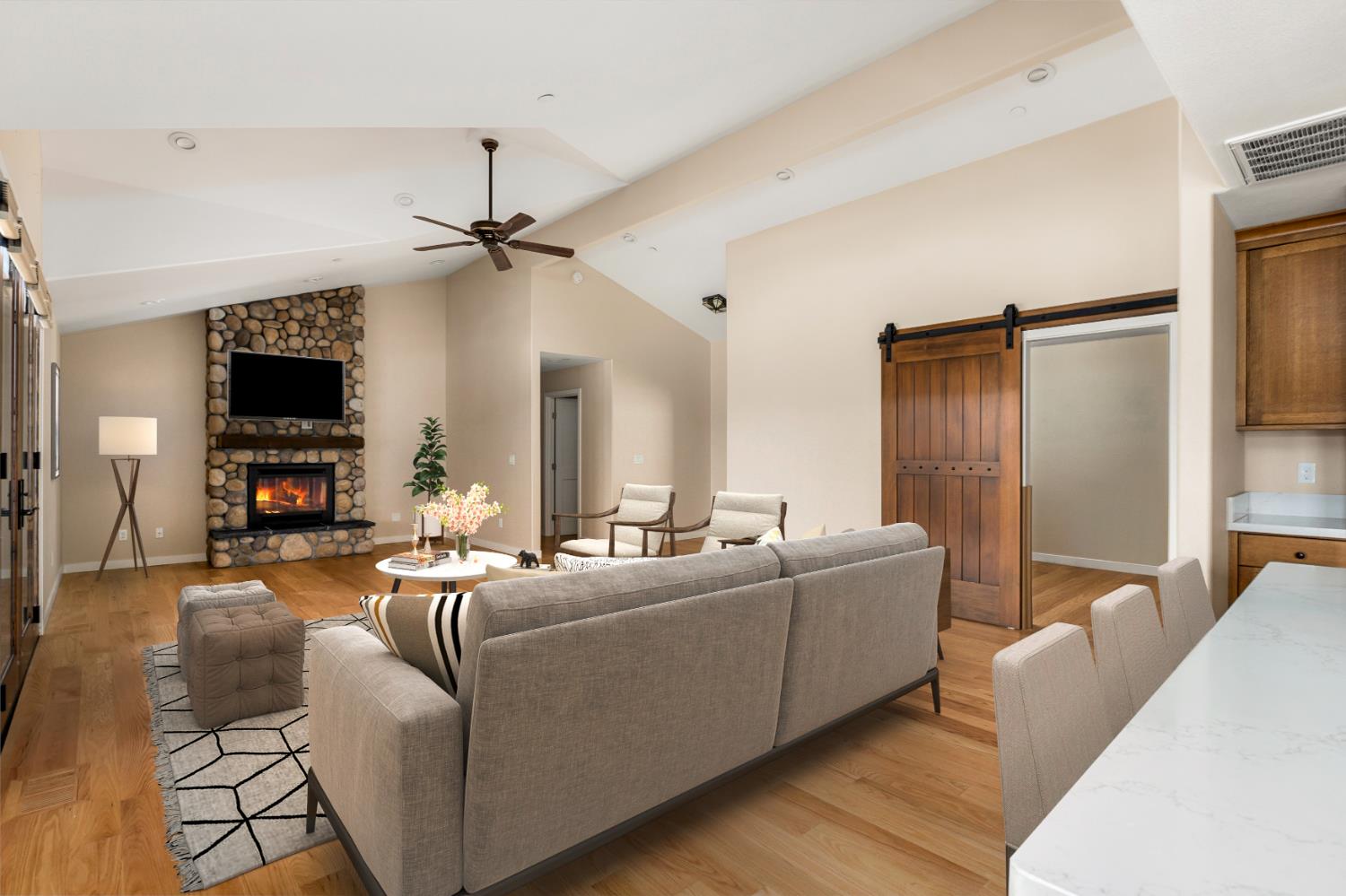 13859 Ginger Loop Penn Valley, CA 95946 - Photo 23 of 50 a living room with furniture a fireplace and a flat screen tv
